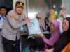 Kawal Program Nasional, Kapolres Selayar Hadiri dan Salurkan Langsung Bantuan Beras Alokasi Juni-Juli 2025 di Bontomatene